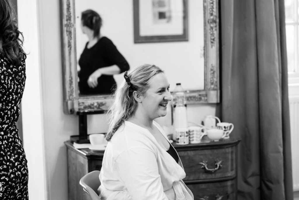 A bride at a wedding by a Cornwall wedding photographer