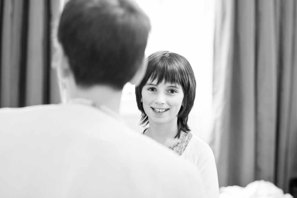 A young girl at a wedding by a Cornwall wedding photographer