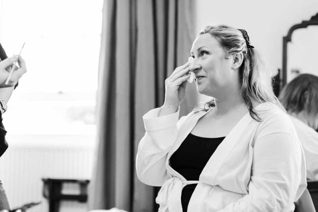 A crying bride at a wedding by a Cornwall wedding photographer