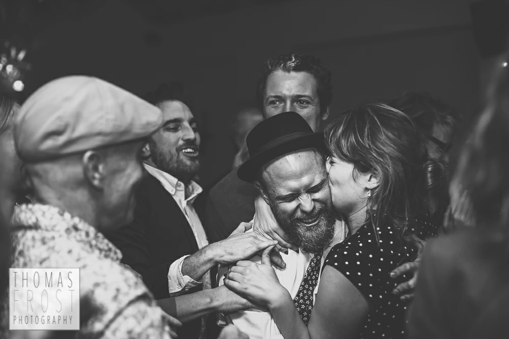 Crowdsurfing groom at Prittlewell Priory Wedding, Southend-on-sea.