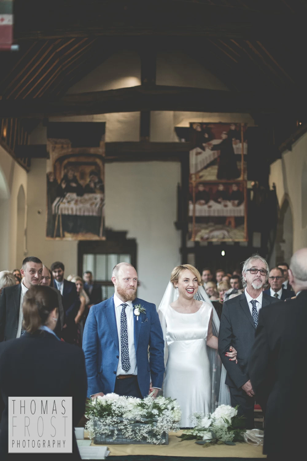 Bride and Groom at alter at Prittlewell Priory Wedding, Southend-on-sea.