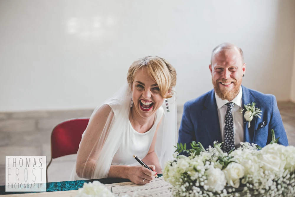 Singing of the registrar at Prittlewell Priory Wedding, Southend-on-sea.