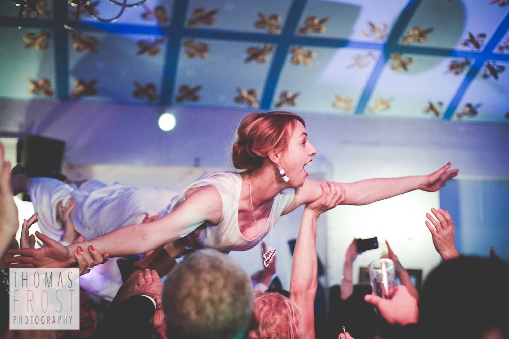 Crowdsurfing bride at Prittlewell Priory Wedding, Southend-on-sea.