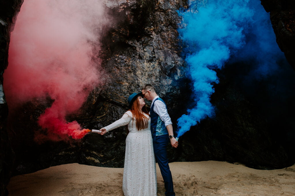 couple with smoke bombs