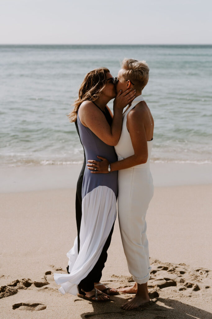 a wedding kiss on the beach