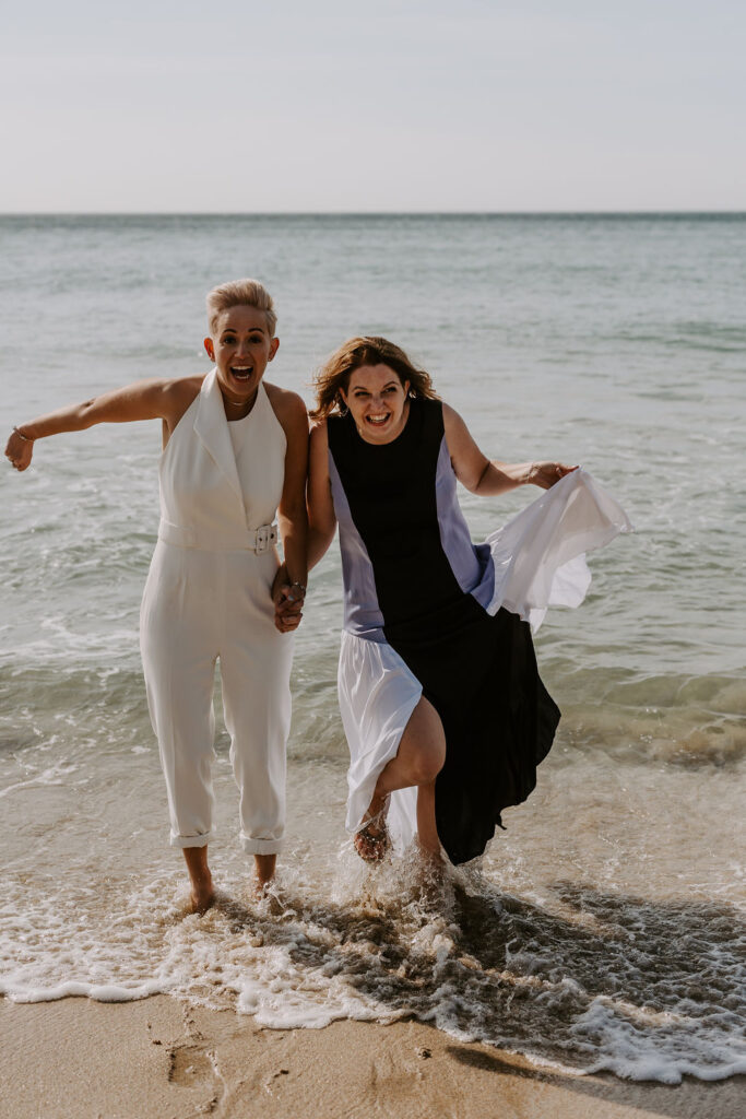 elopement couple in the sea in Cornwall