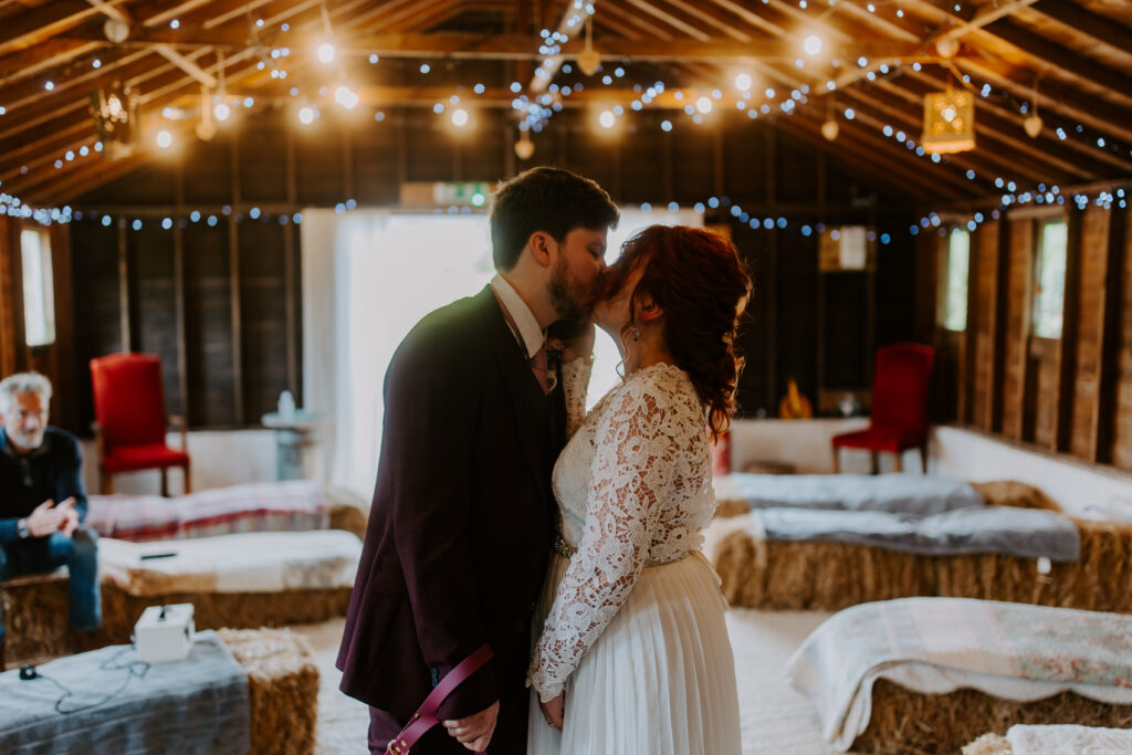 bride and groom kiss at Cornwall wedding