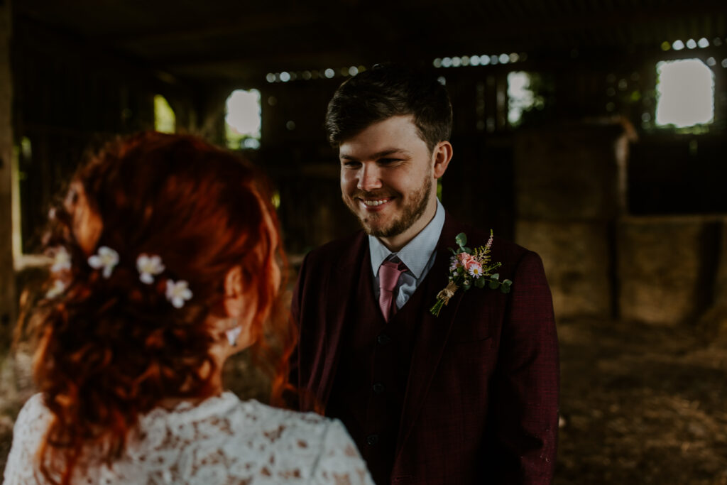 groom takes his vows at Cowshed Cornwall wedding