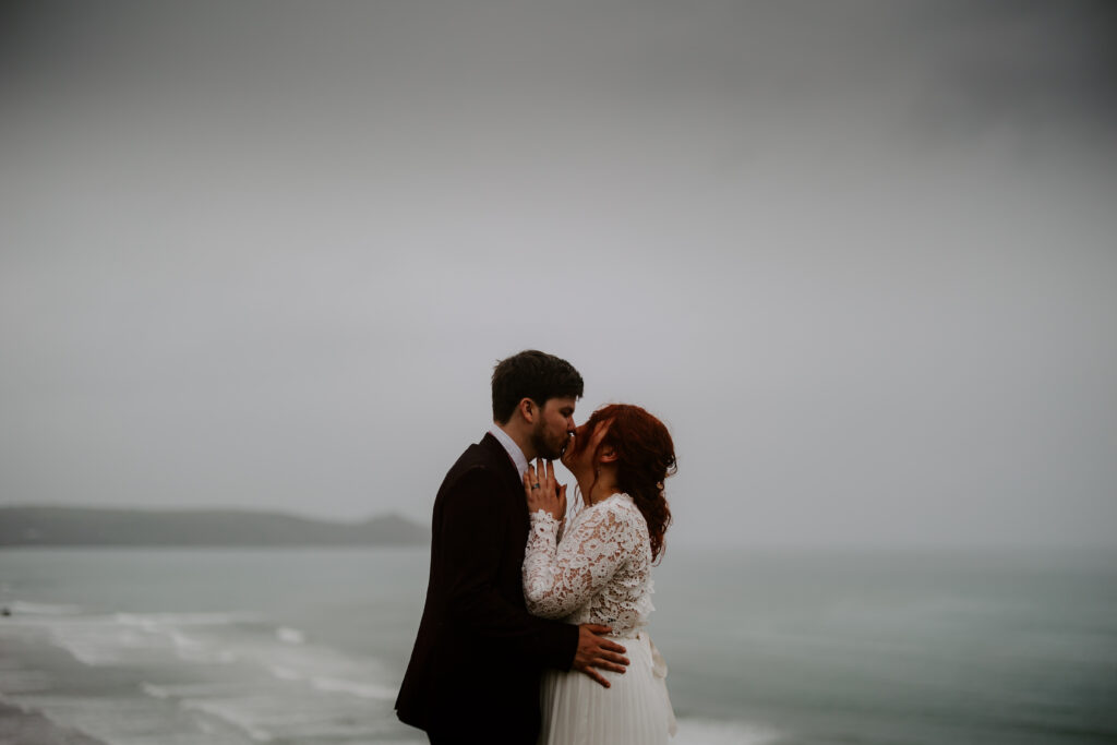 romantic wedding day kiss in Cornwall