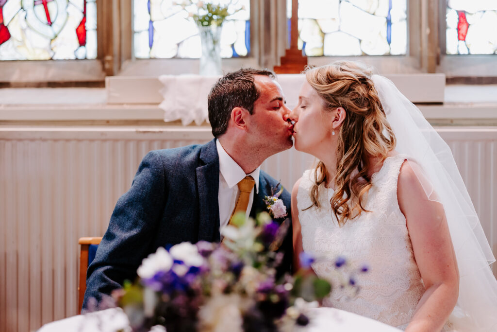 Devon wedding day kiss after signing the register