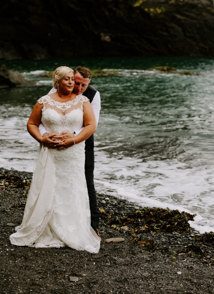 romantic beach image of bride and groom at Devon wedding