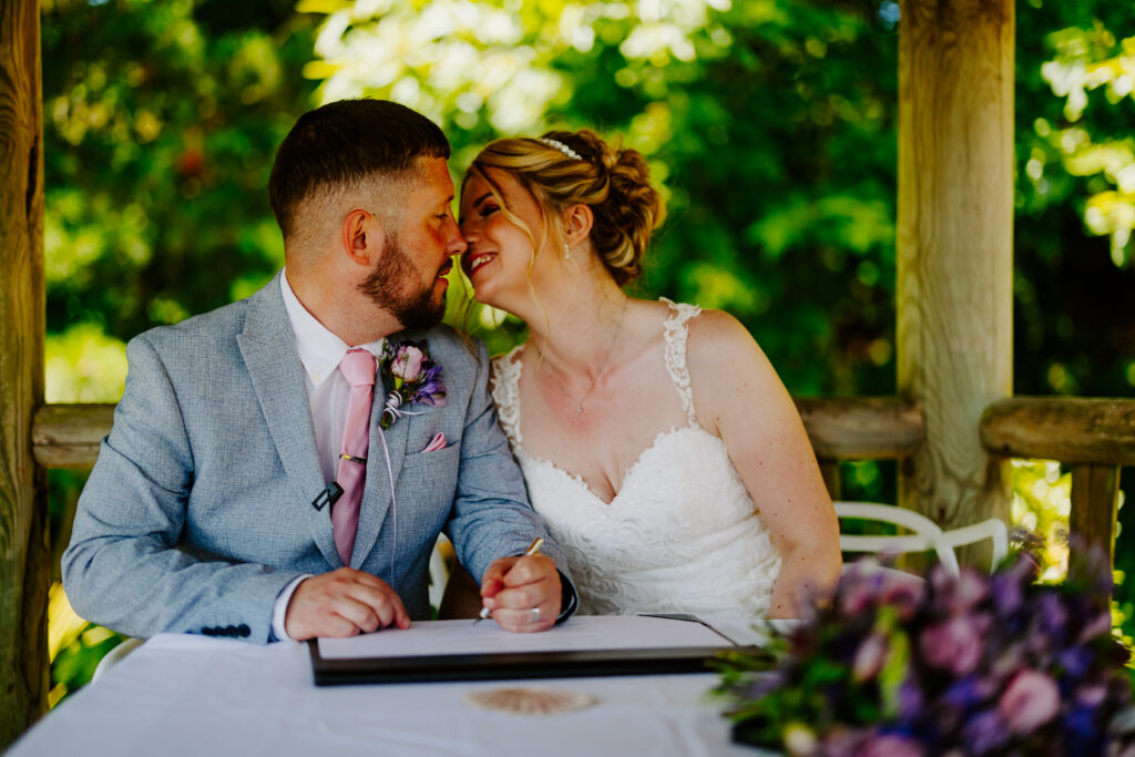 signing the register at Cornwall wedding