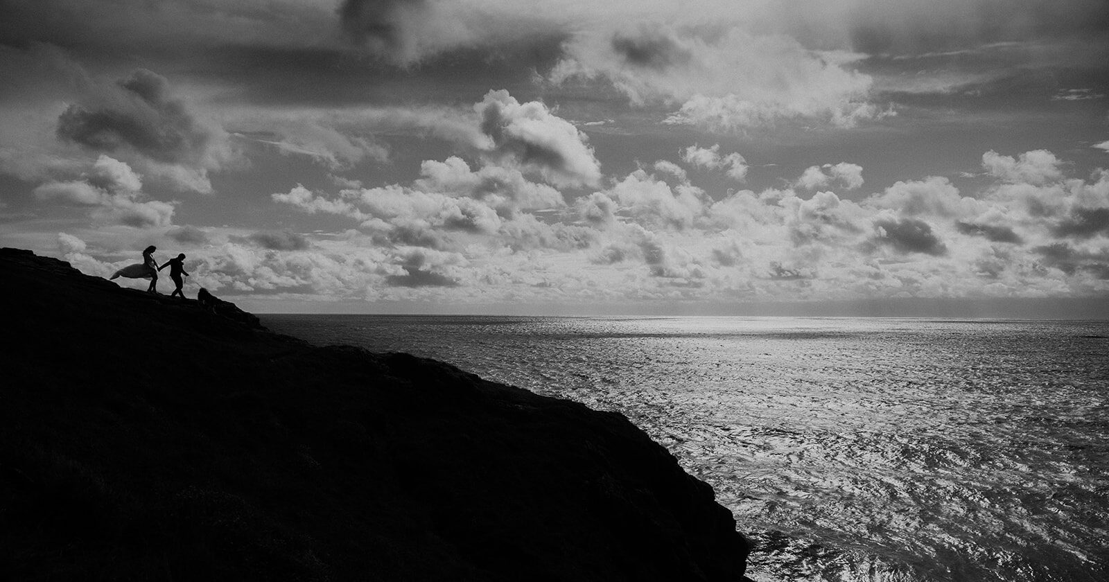 Cornwall Elopements, couple on cliffs in Cornwall getting married.