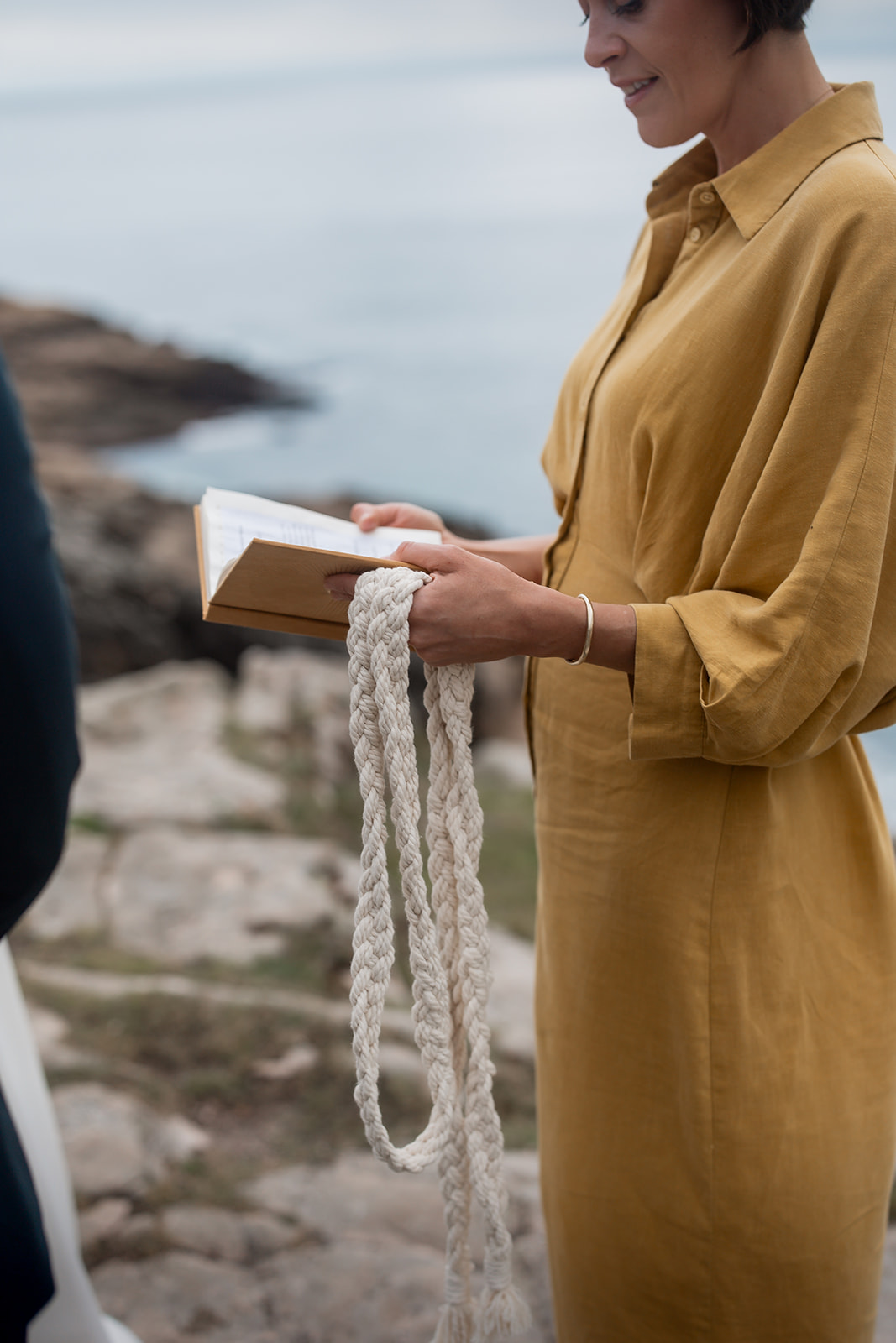 Celebrant on cliffs with a couple.